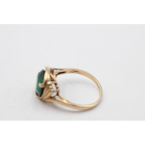 104 - A 9ct gold green synthetic spinel cocktail ring by Birks, size P½ - approx. gross weight 3.8 grams