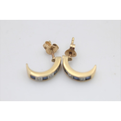 105 - A pair of 9ct gold sapphire and diamond half hoop earrings - approx. gross weight 1.7 grams