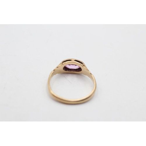 106 - A 9ct gold synthetic sapphire solitaire ring, size L - approx. gross weight 1.7 grams