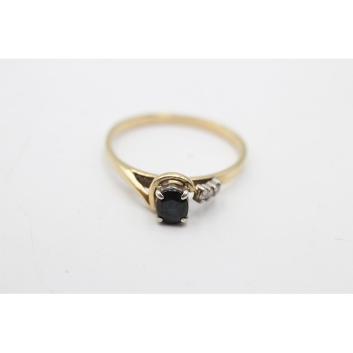 112 - A 9ct gold diamond and sapphire dress ring - approx. gross weight 1.6 grams