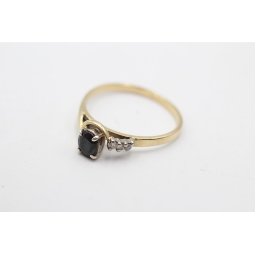 112 - A 9ct gold diamond and sapphire dress ring - approx. gross weight 1.6 grams