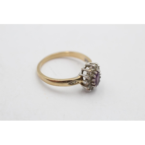 124 - A 9ct gold vintage amethyst and clear gemstone dress ring, size N½ - approx. gross weight 2.5 grams