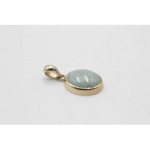 127 - A 9ct gold jade pendant and diamond earrings set - approx. gross weight 6.6 grams