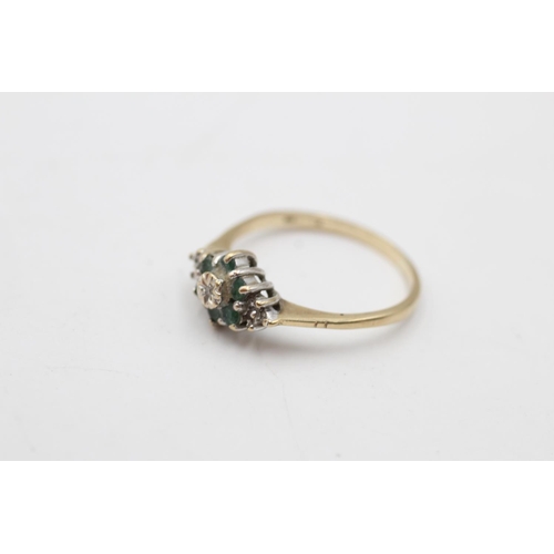 129 - A 9ct gold emerald and diamond dress ring, size R - approx. gross weight 2.2 grams