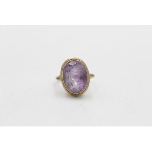 13 - A hallmarked Birmingham 9ct gold amethyst dress ring, size K½ - approx. gross weight 3.4 grams