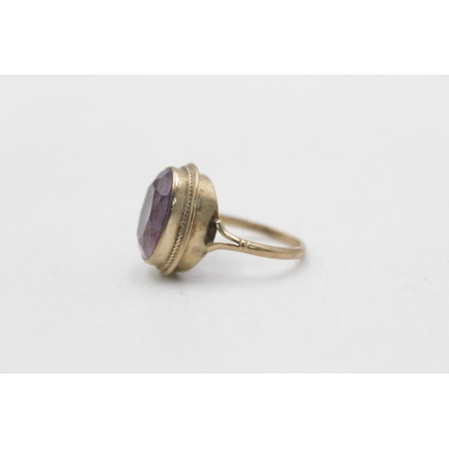 13 - A hallmarked Birmingham 9ct gold amethyst dress ring, size K½ - approx. gross weight 3.4 grams