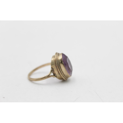 13 - A hallmarked Birmingham 9ct gold amethyst dress ring, size K½ - approx. gross weight 3.4 grams