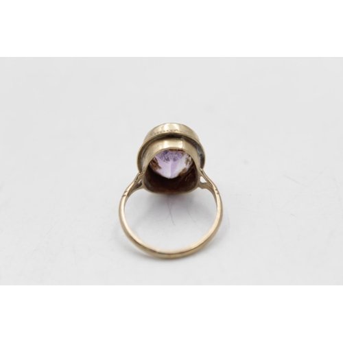 13 - A hallmarked Birmingham 9ct gold amethyst dress ring, size K½ - approx. gross weight 3.4 grams