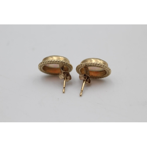 133 - A pair of 9ct gold opal stud earrings - approx. gross weight 2.8 grams