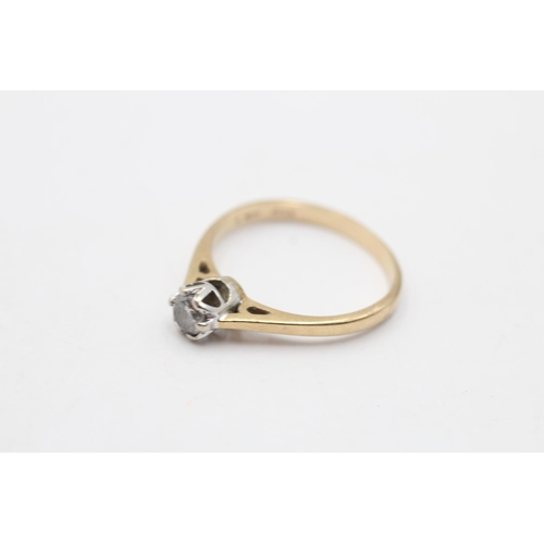 134 - A 9ct gold diamond cathedral set solitaire ring, size N½ - approx. gross weight 1.8 grams