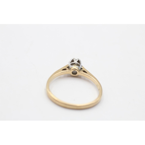 134 - A 9ct gold diamond cathedral set solitaire ring, size N½ - approx. gross weight 1.8 grams