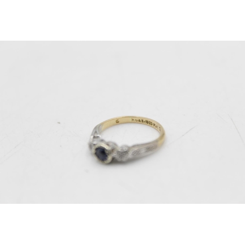 141 - An 18ct gold and platinum diamond and sapphire three stone ring, size I½ - approx. gross weight 2.2 ... 