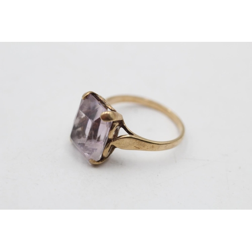 142 - A hallmarked London 9ct gold amethyst cocktail ring, size M½ - approx. gross weight 3.1 grams