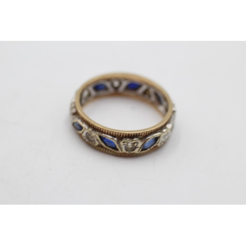 143 - A 9ct gold synthetic sapphire and synthetic spinel eternity ring, size N½ - approx. gross weight 3.5... 