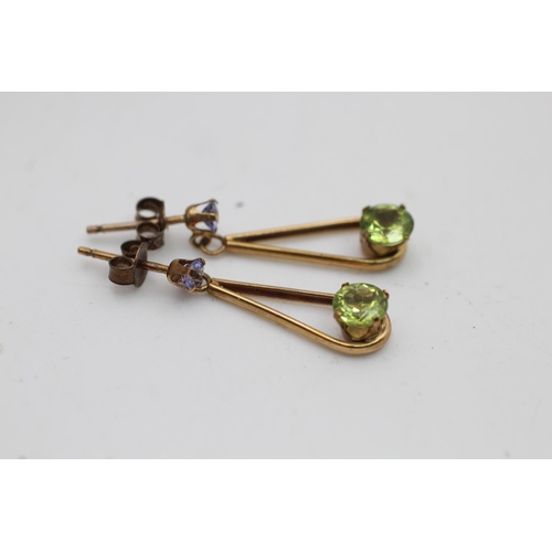 144 - A pair of 9ct gold amethyst and peridot drop earrings - approx. gross weight 1.2 grams