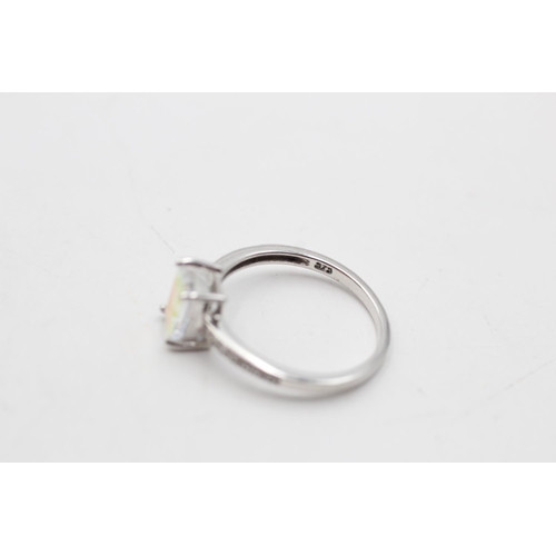 15 - A 9ct gold quartz and diamond dress ring, size N½ - approx. gross weight 2.1 grams