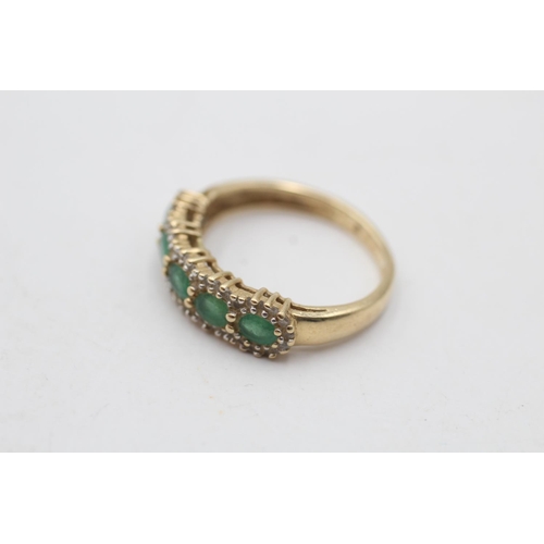 153 - A 14ct gold emerald and diamond pave ring, size N - approx. gross weight 2.6 grams