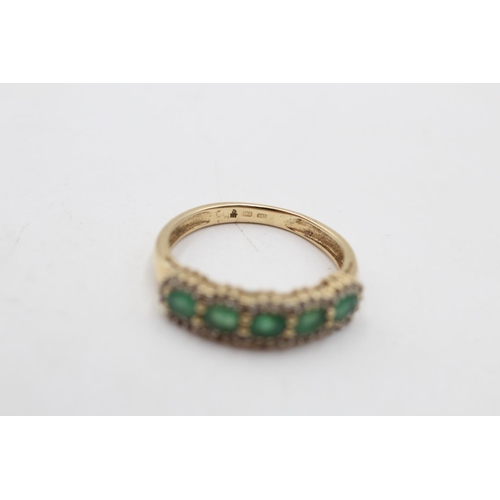 153 - A 14ct gold emerald and diamond pave ring, size N - approx. gross weight 2.6 grams