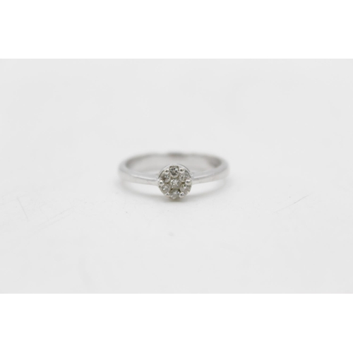 154 - Two 9ct white gold diamond rings, one cluster size Q½ and one stylised size O - approx. gross weight... 