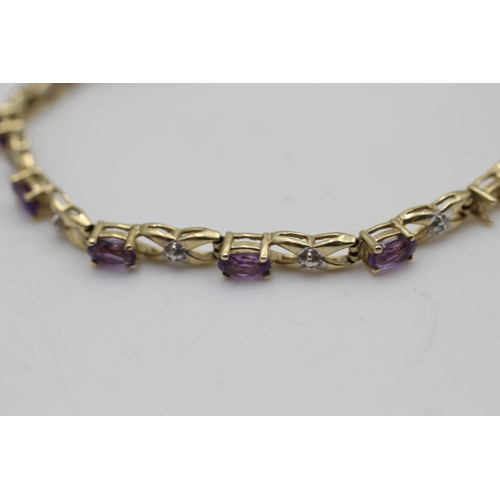 158 - A 10ct gold amethyst bracelet - approx. gross weight 5.5 grams