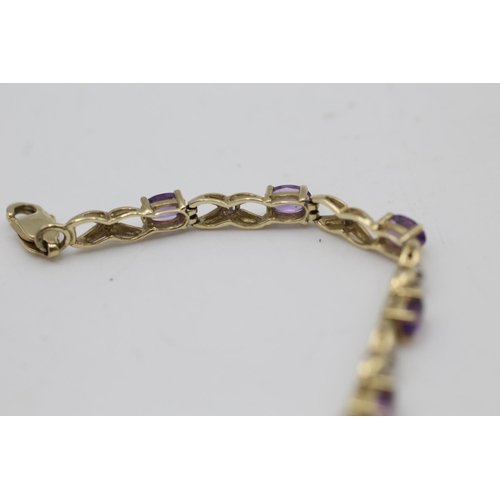 158 - A 10ct gold amethyst bracelet - approx. gross weight 5.5 grams