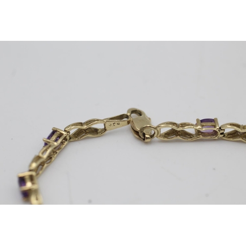 158 - A 10ct gold amethyst bracelet - approx. gross weight 5.5 grams