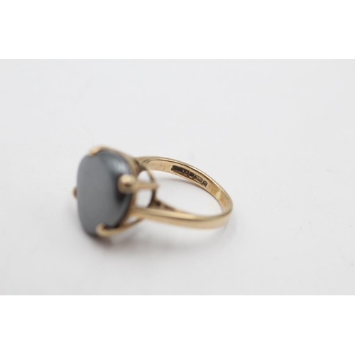 162 - A 9ct gold obscure shaped hematite ring, size G½ - approx. gross weight 4.2 grams