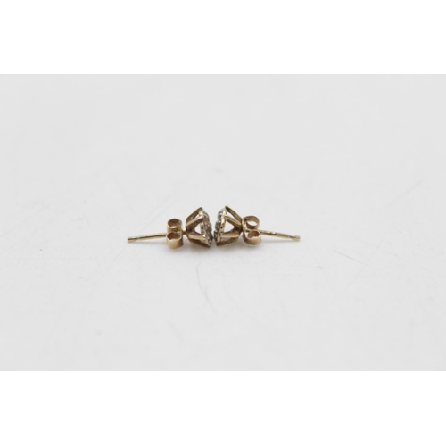 164 - Two pieces of 9ct gold diamond detail jewellery, one pair of stud earrings and one ring, size L½ - a... 