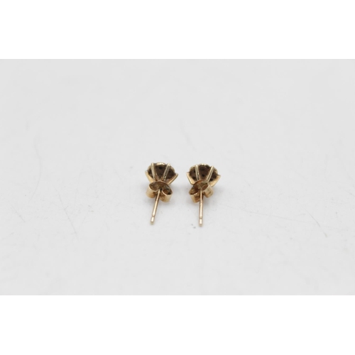 164 - Two pieces of 9ct gold diamond detail jewellery, one pair of stud earrings and one ring, size L½ - a... 