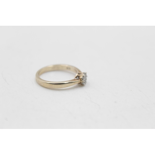 164 - Two pieces of 9ct gold diamond detail jewellery, one pair of stud earrings and one ring, size L½ - a... 