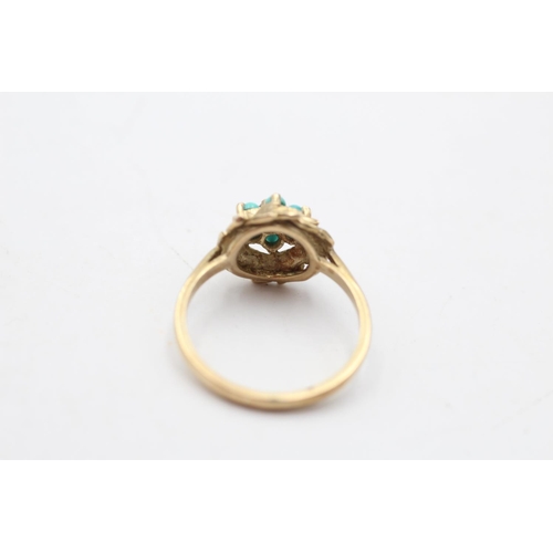 166 - A 9ct gold turquoise set dress ring, size O - approx. gross weight 2.7 grams