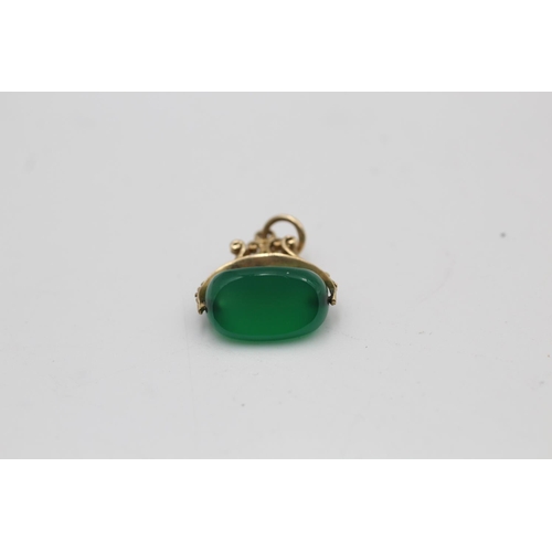 171 - A 9ct gold chrysoprase spinning fob - approx. gross weight 2.7 grams