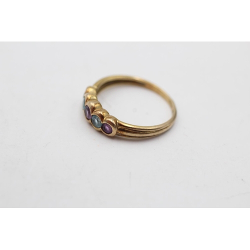 172 - A 9ct gold amethyst and topaz five stone ring, size K½  - approx. gross weight 1.6 grams