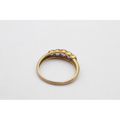 172 - A 9ct gold amethyst and topaz five stone ring, size K½  - approx. gross weight 1.6 grams