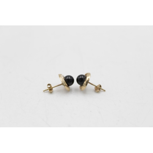 175 - Three pairs of 9ct gold gemstone earrings to include onyx studs, reconstituted turquoise drop etc. -... 