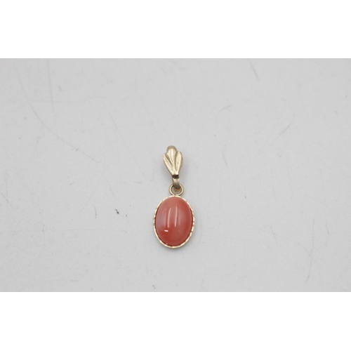 178 - A 9ct gold coral stud earrings and pendant set - approx. gross weight 1.2 grams