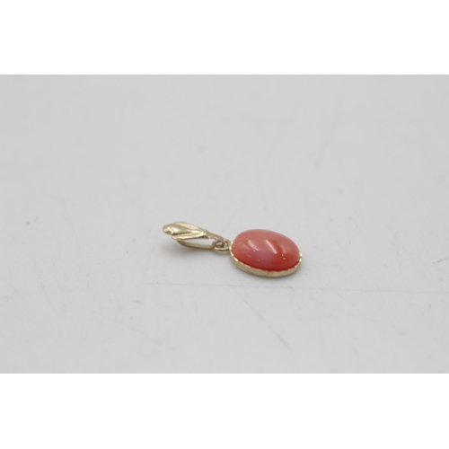 178 - A 9ct gold coral stud earrings and pendant set - approx. gross weight 1.2 grams