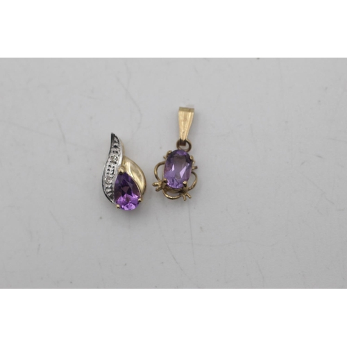 2 - Three 9ct gold amethyst pendants to include diamonds - approx. gross weight 2.3 grams