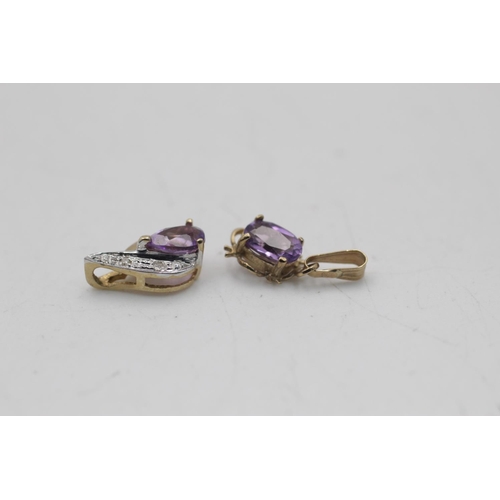 2 - Three 9ct gold amethyst pendants to include diamonds - approx. gross weight 2.3 grams