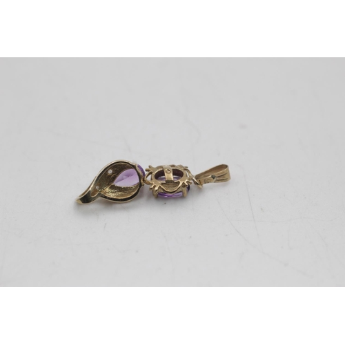 2 - Three 9ct gold amethyst pendants to include diamonds - approx. gross weight 2.3 grams