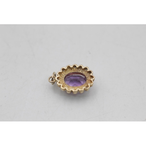 2 - Three 9ct gold amethyst pendants to include diamonds - approx. gross weight 2.3 grams