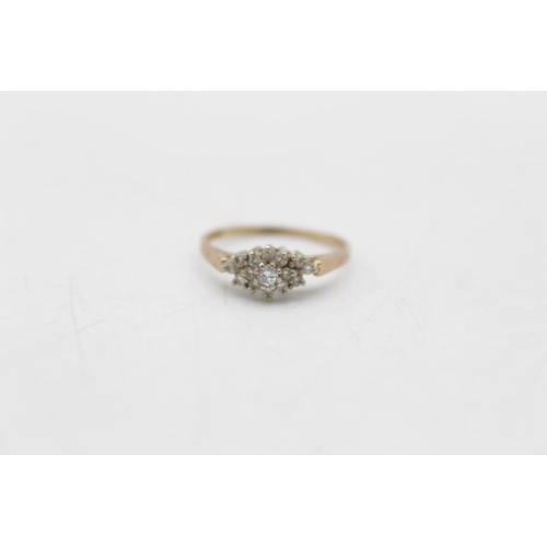 23 - A 14ct gold diamond floral cluster ring, size N½ - approx. gross weight 1.9 grams