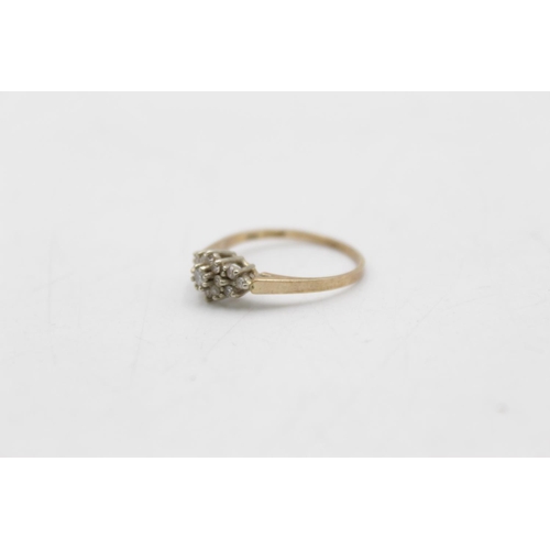 23 - A 14ct gold diamond floral cluster ring, size N½ - approx. gross weight 1.9 grams