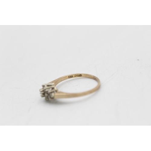 23 - A 14ct gold diamond floral cluster ring, size N½ - approx. gross weight 1.9 grams