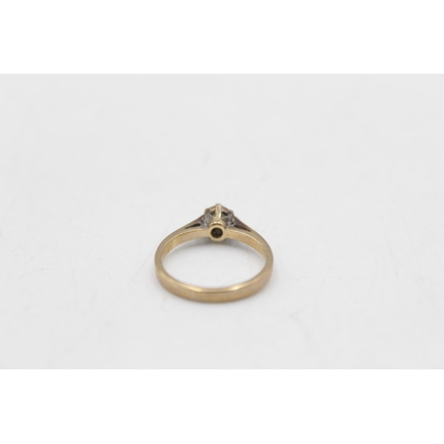 25 - A 9ct gold diamond cathedral set solitaire ring, size J½ - approx. gross weight 1.9 grams