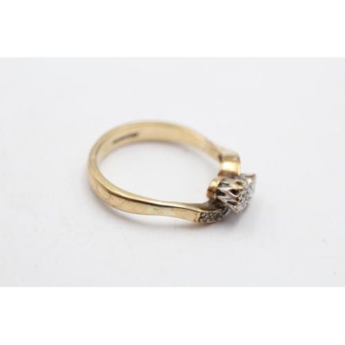 27 - A hallmarked Birmingham 9ct gold diamond moi et toi bypass ring, size Q - approx. gross weight 3.6 g... 