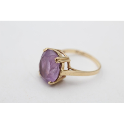 29 - A 14ct gold amethyst solitaire ring, size P½ - approx. gross weight 4.4 grams