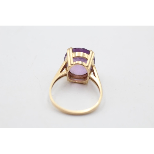 29 - A 14ct gold amethyst solitaire ring, size P½ - approx. gross weight 4.4 grams