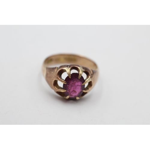 30 - A George V hallmarked Birmingham 9ct gold garnet claw set dress ring, size N and dated 1919 - approx... 