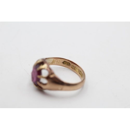 30 - A George V hallmarked Birmingham 9ct gold garnet claw set dress ring, size N and dated 1919 - approx... 